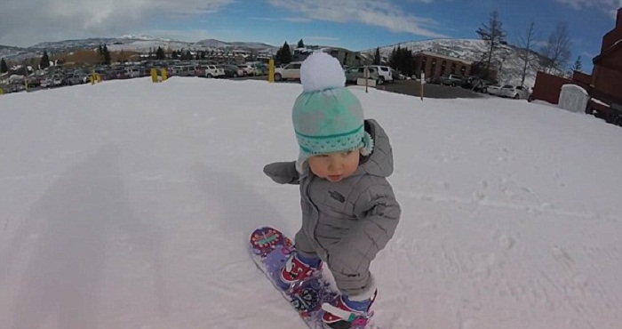 Incredible tot rides a snowboard at just 14 MONTHS - VIDEO